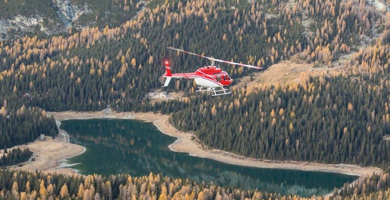 Sorvolo delle montagne e valli alpine con elicottero a Sondrio