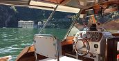 Escursione e cena romantica sul lago di Como a bordo di una barca d'epoca