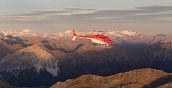 Panorama mozzafiato della Valtellina e delle Alpi durante un volo in elicottero