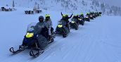 Escursione in motoslitta nella Val Brembana tra boschi e montagne