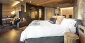 Suite Spa a Livigno con letto king size e atmosfera romantica alpina