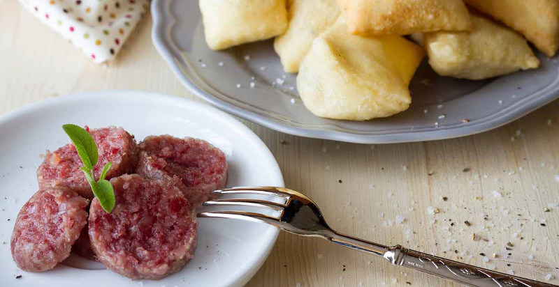 Cotechino e timballo di riso ripieno - Cucina parmigiana